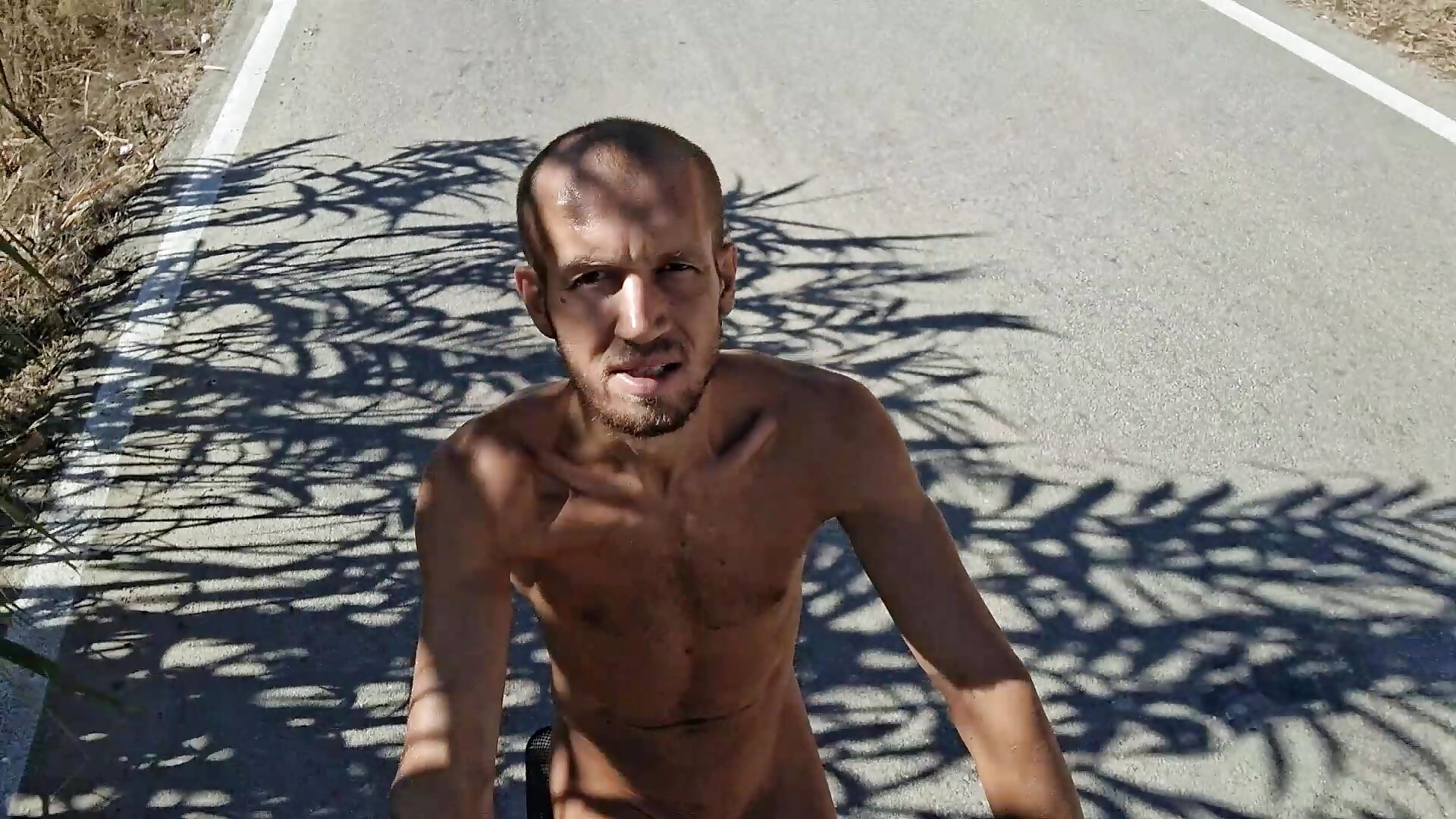 Riding a bicycle naked on a public street