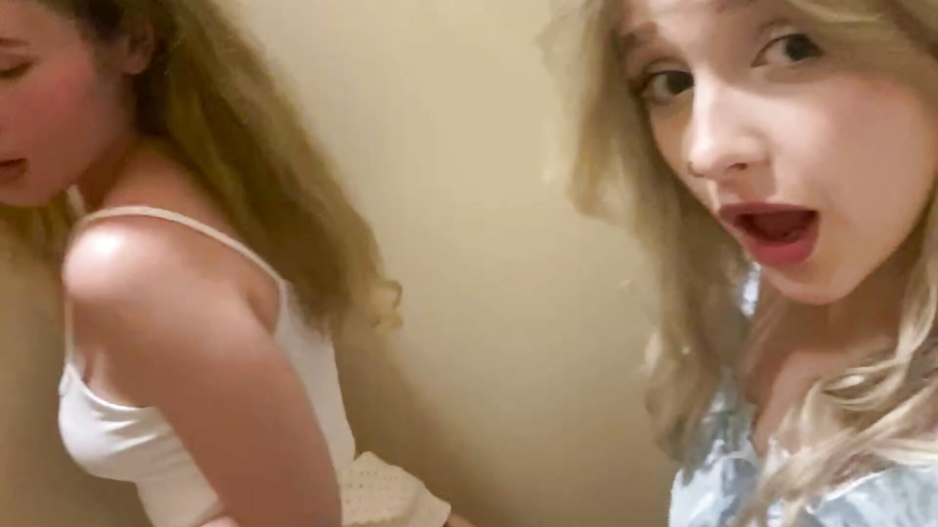 oops girls naughty slap each other bums in stall!