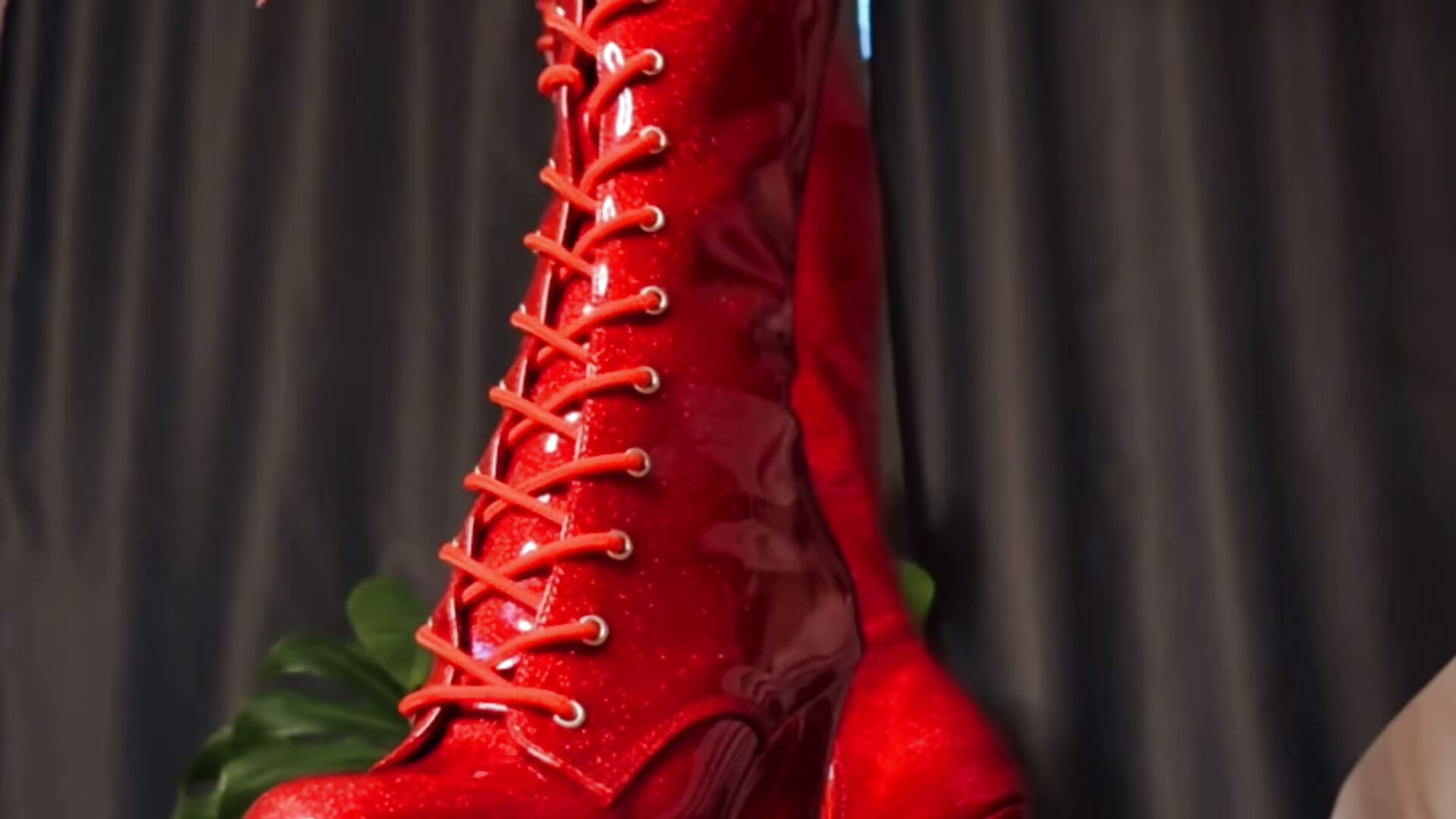 Teasing in red boots