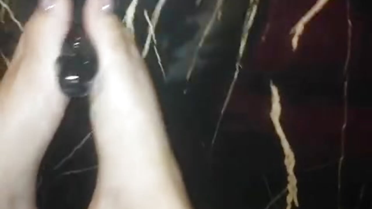 Dildo footjob