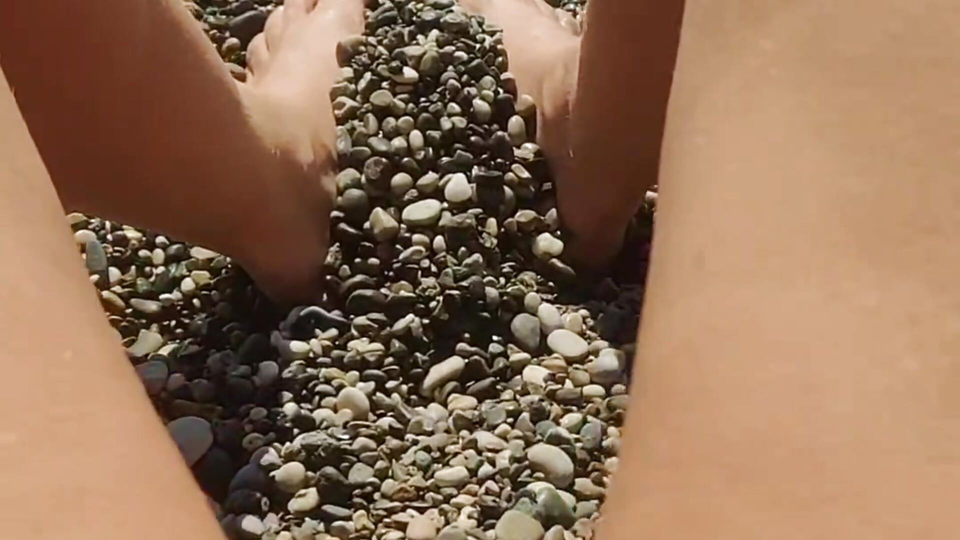 I'm playing with pebbles on the beach #feet #beach #outdoor