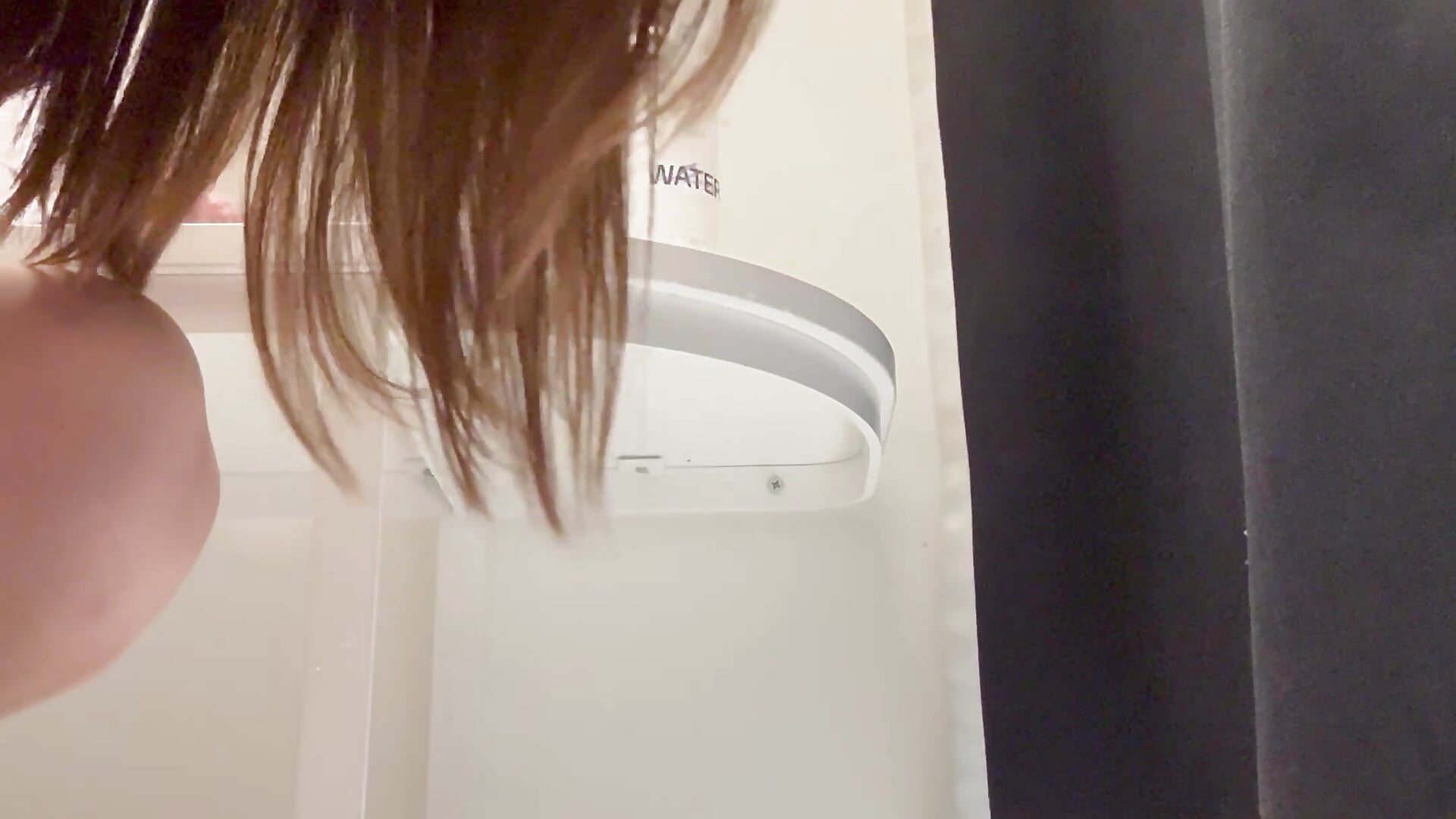 Squirt on the curtain in the fitting room next to people