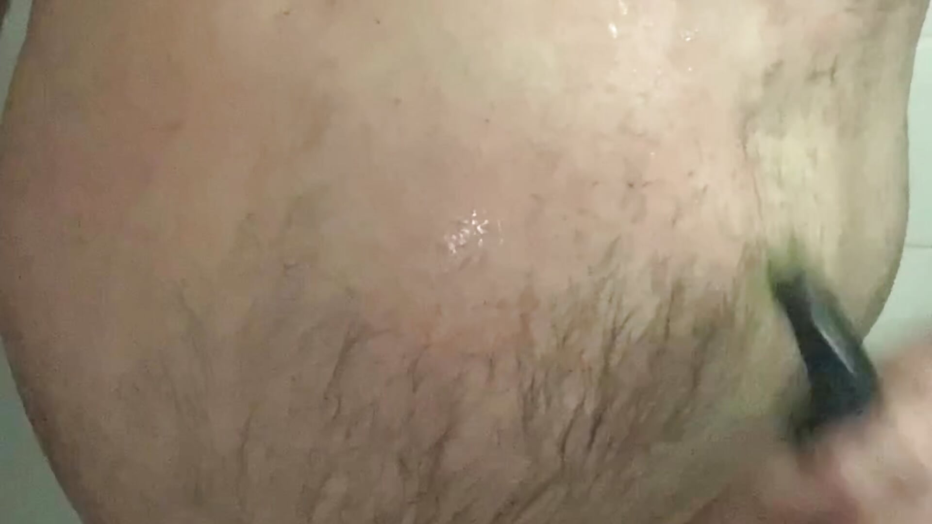 Shaving chest and stomach in Shower