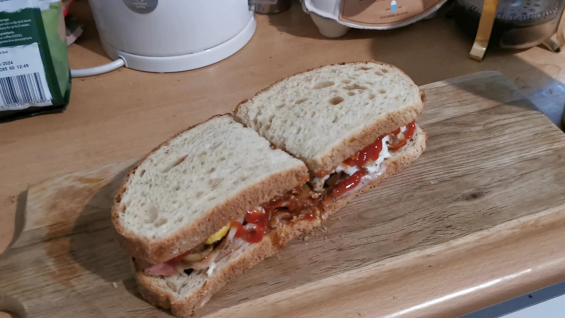 Breakfast egg and bacon sandwich with mushrooms and ketchup on toast. Also roast and ground coffee - video by theSmallest-dick cam model