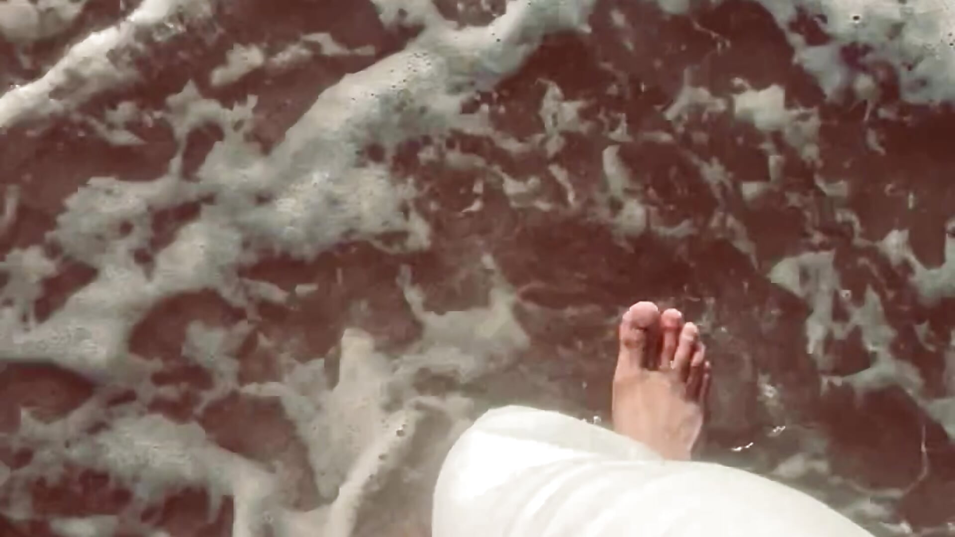 Beach feet and sand