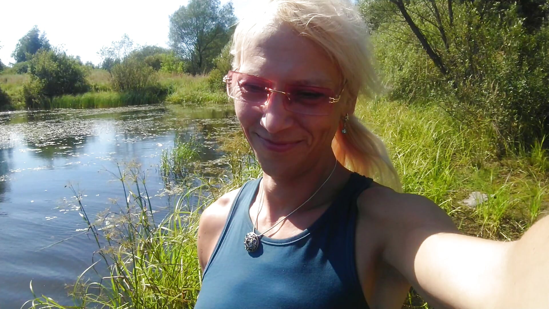 Hot! I swim in the lake in a T-shirt and shorts... Wetlook in clothes... - video by Alexa_Cosmic cam model