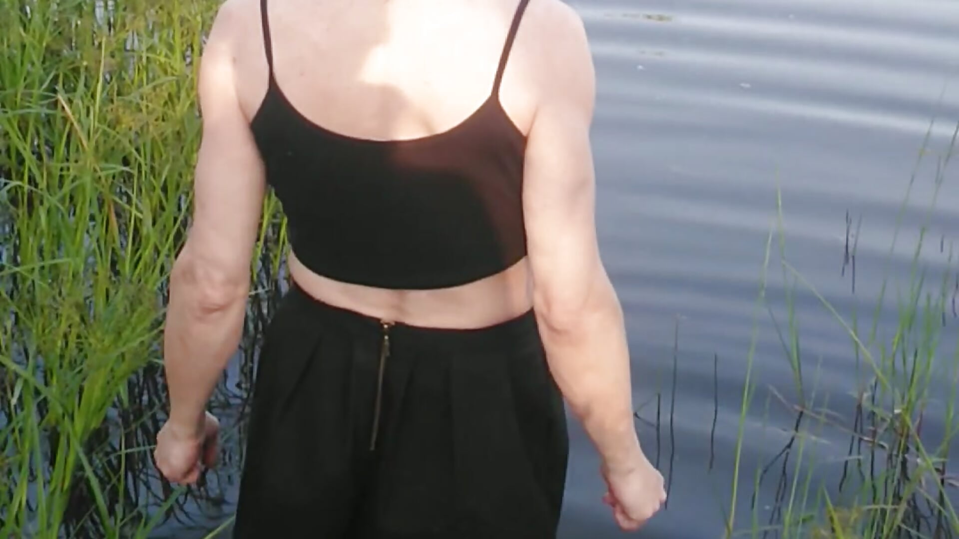 Me swimming in lake in black stockings, black skirt,  black tank top and pink sneakers.... - video by Alexa_Cosmic cam model