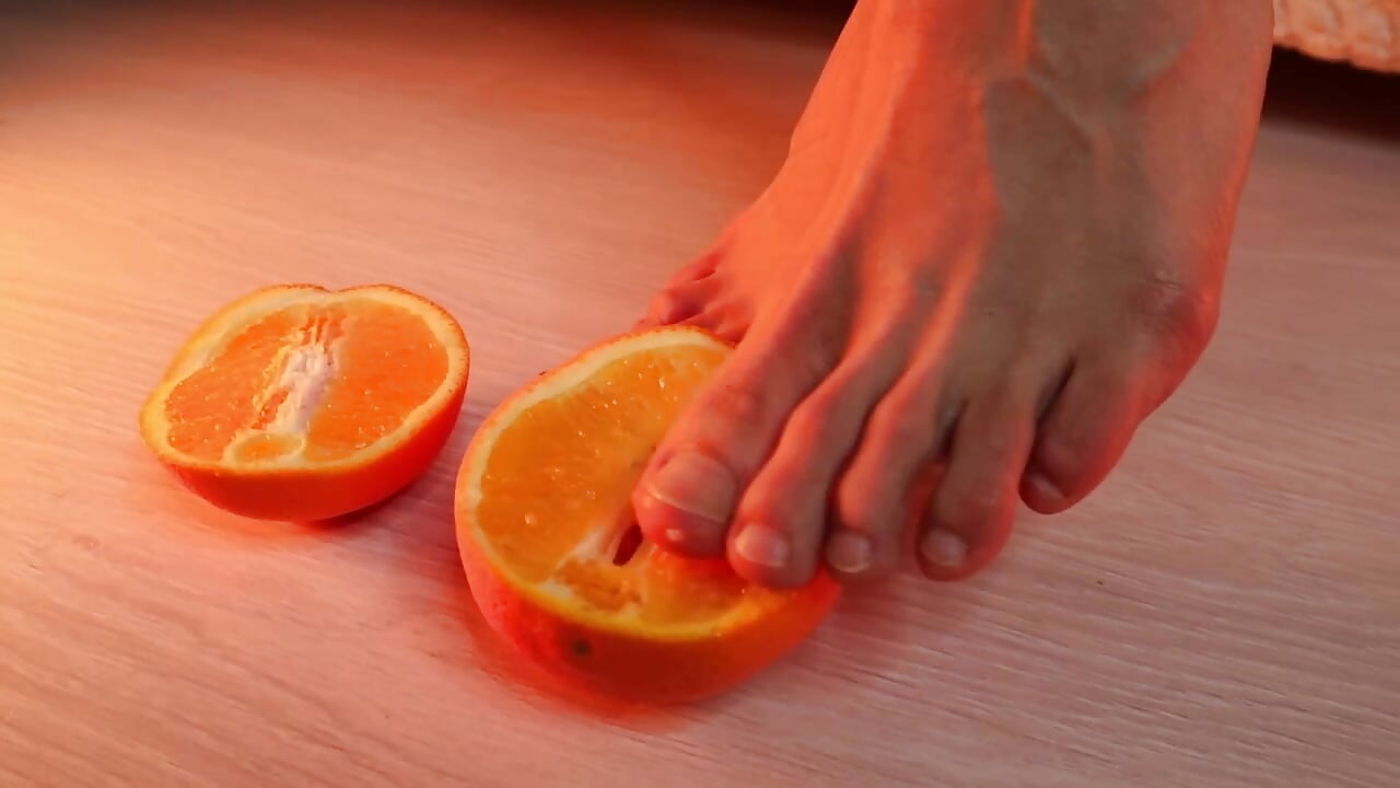 playing with orange (footfetish, feet)