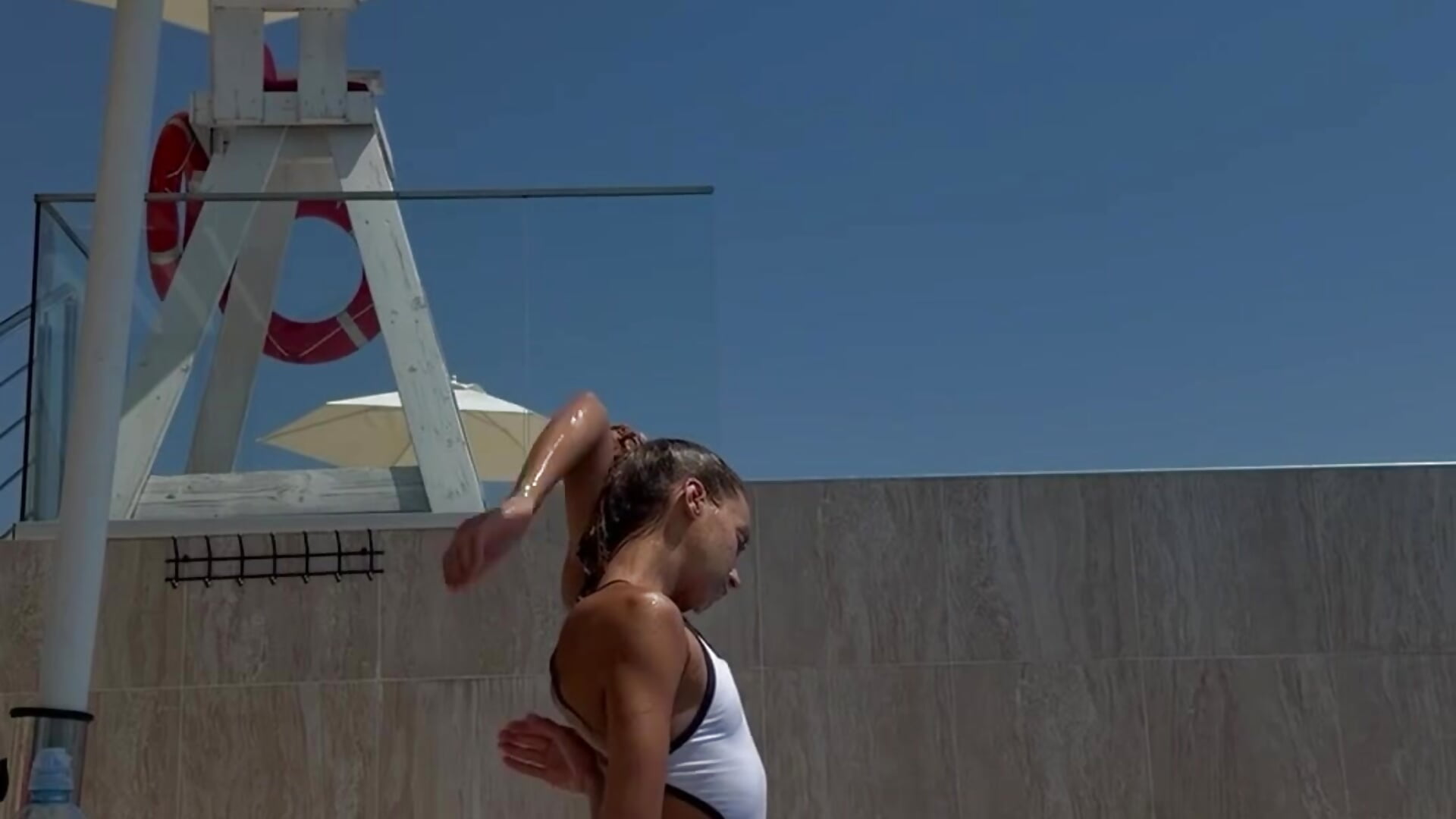 Master of Sports in Poolside Posing