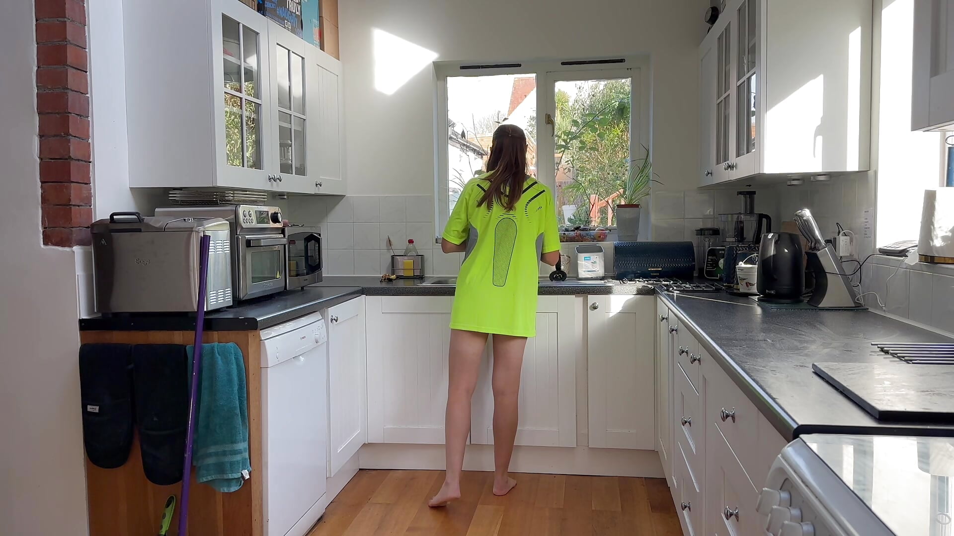 This housewife is ONLY wearing a T-Shirt