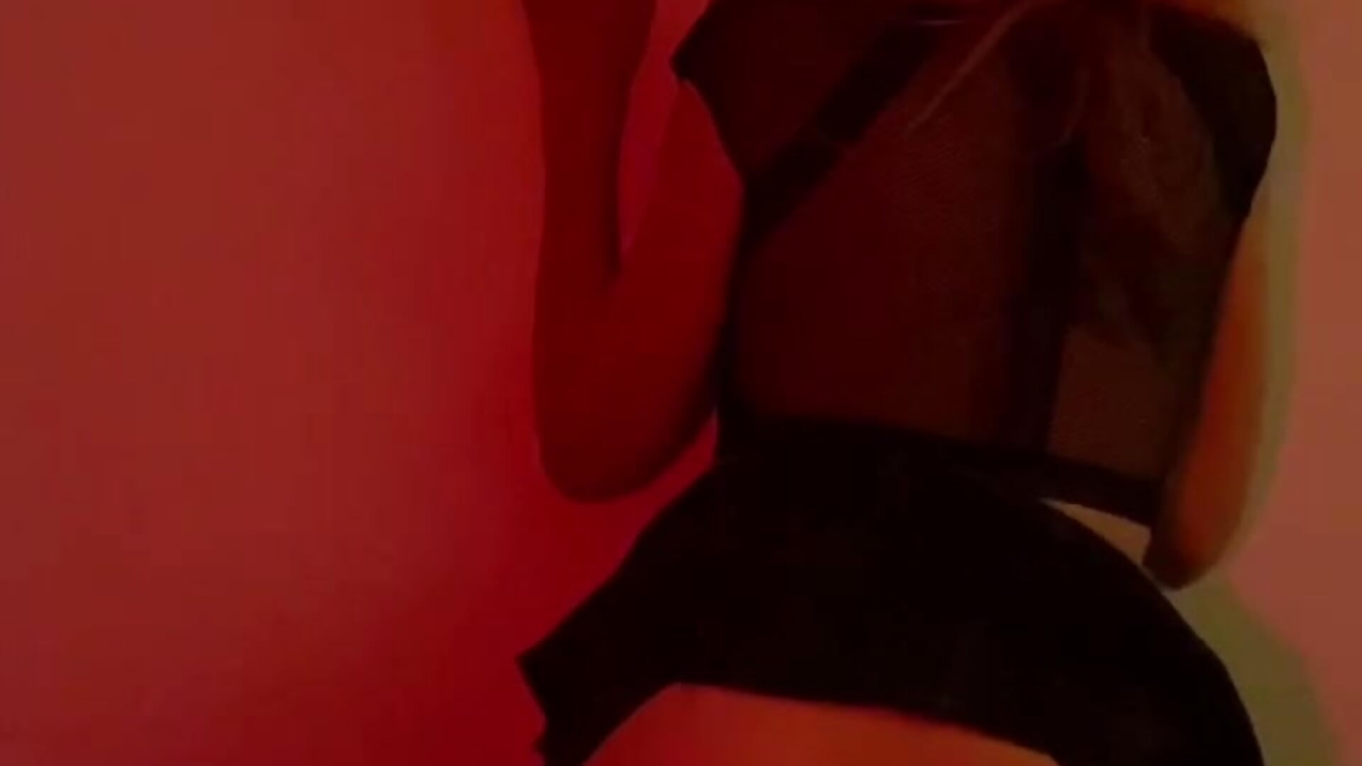Seductive striptease in fishnet