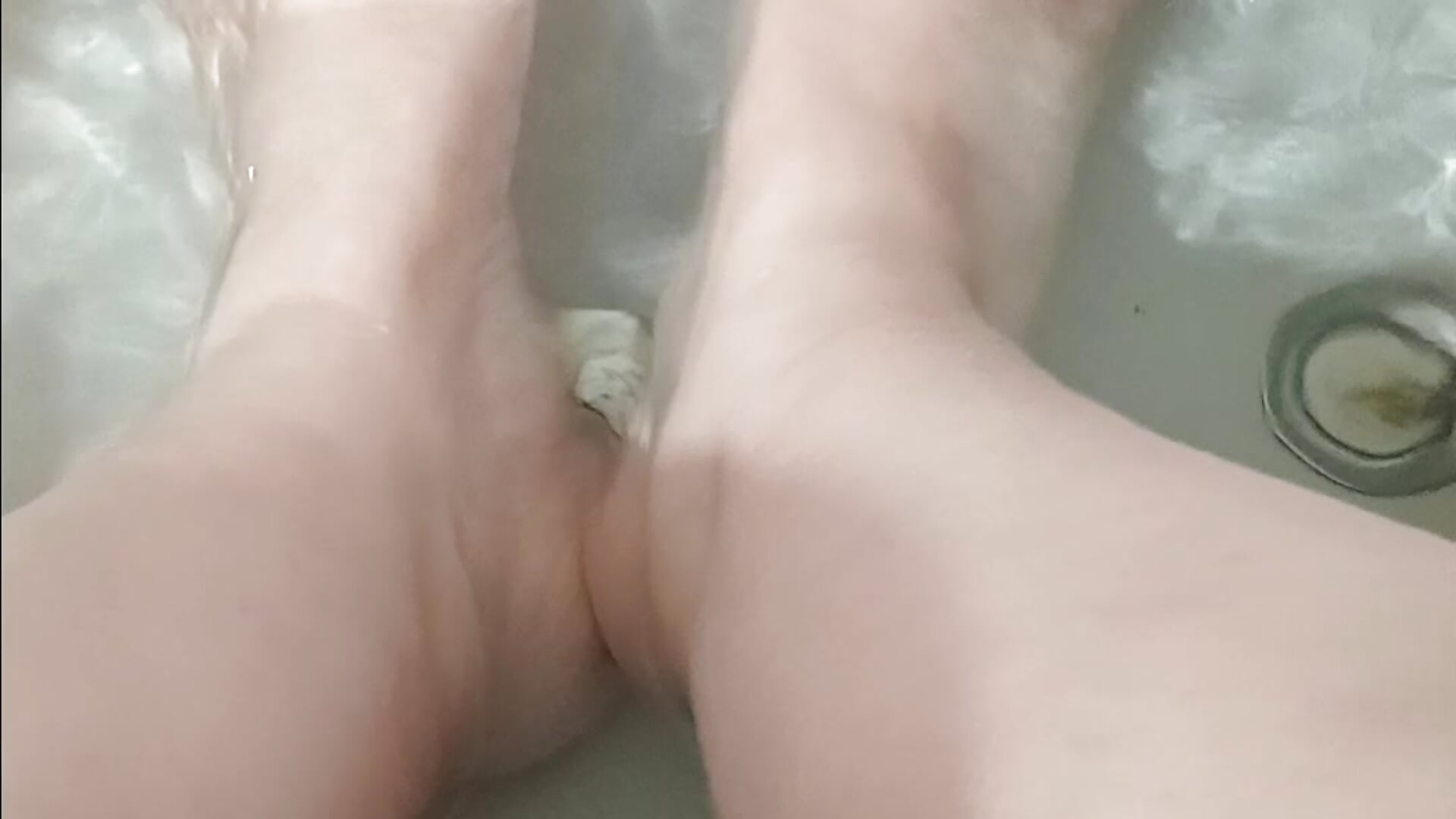 My feet in water