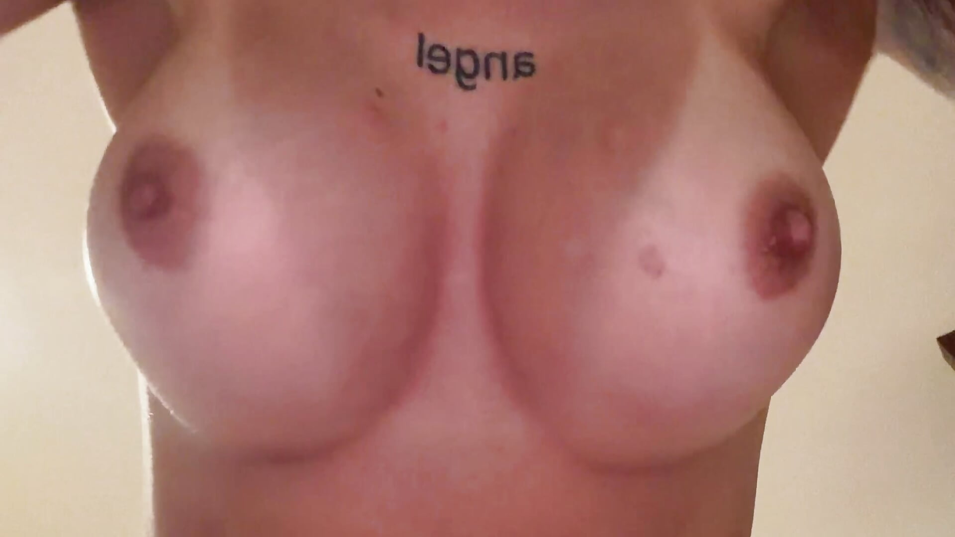 Tanned naked tits!