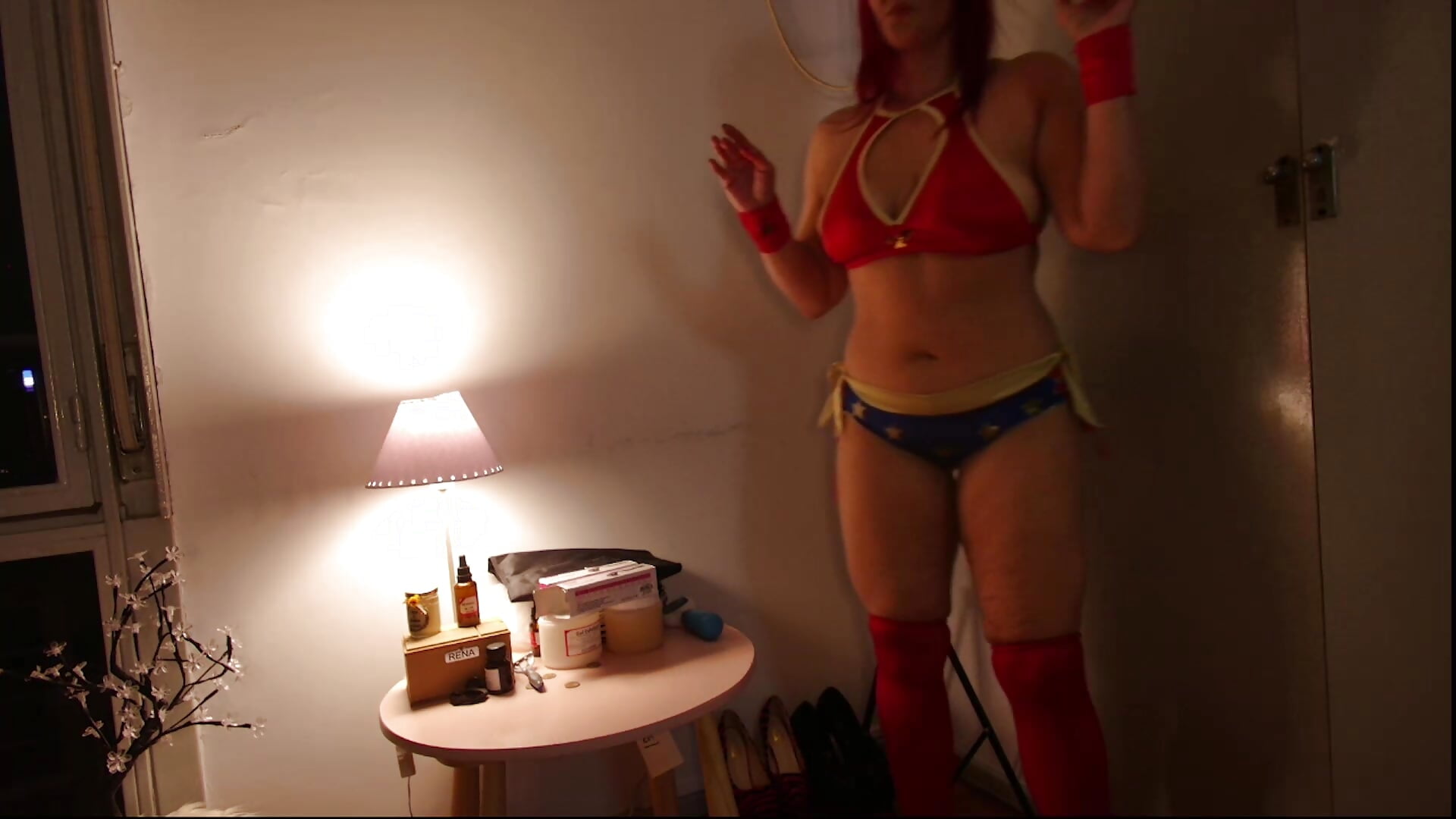 cosplay wonder woman taking off